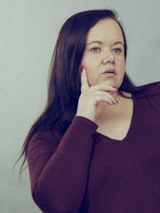 Thinking adult woman