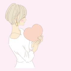 ハートを持つ女性