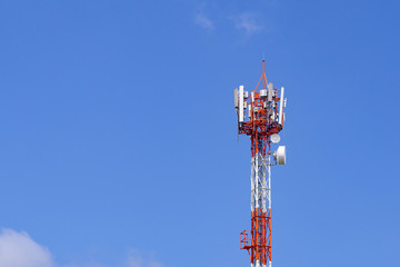 Telecommunication tower on blue sky background