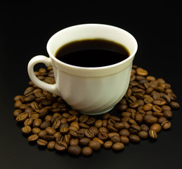 cup of coffee with beans
