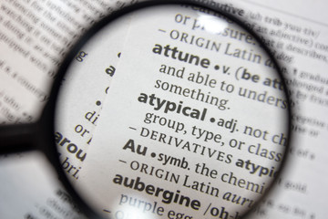 The word of phrase - atypical - in a dictionary.