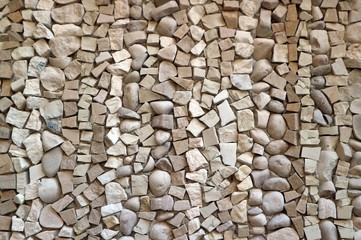 Texture of small pebbles sorted by vertical rows. Background.