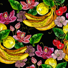 Embroidery lemons, cherry, bananas and flowers lotus. Seamless pattern. Summer fruit art. Tropical fashion template for clothes, textiles and t-shirt design