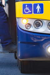 Fototapeta premium Public transportation / bus in urban surroundings on a station.