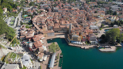 Fototapeta na wymiar Aerial view. Riva del Garda, a resort town in northern Italy. The medieval part of the city is located on the shores of Lake Garda