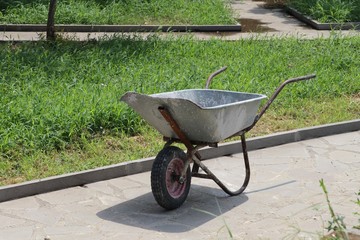 Old wheelbarrow on the garden