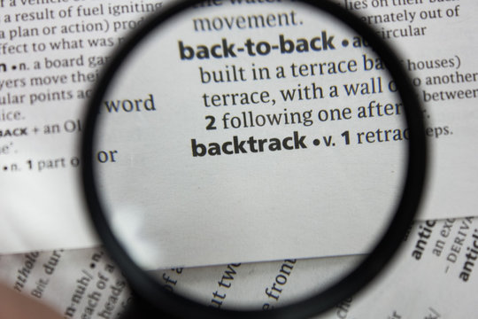 The word or phrase backtrack in a dictionary.