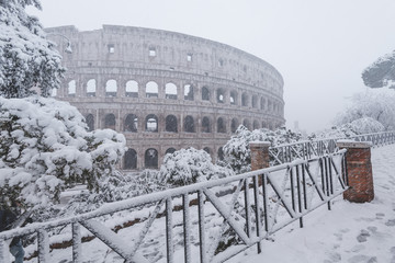Plakat Snow storm in Colosseum Rome Italy