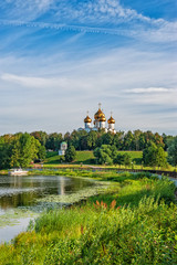 Fototapeta na wymiar Panoramic view of the river Kosorosl, Yaroslavl Arrow and a monument to the 1000th anniversary of Yaroslavl. Russia
