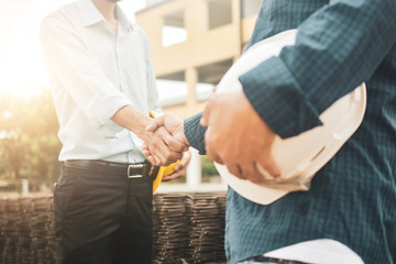 Naklejka premium Business people shaking hands agreement success project estate building construction,Hand shake agreement concept