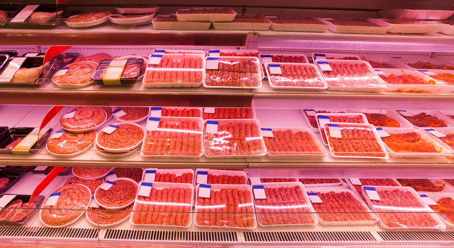 fresh raw meat in casserole for sale in supermarket or shop