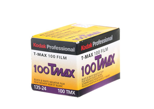 Stockholm, Sweden - June 13, 2013: A pack of about 2003 with black and white negative film, Kodak TMAX 100 for 24 exposures. Isolated on white background.