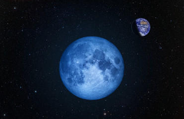 Blue Moon and Earth from outer space with millions of stars around it."Elements of this image furnished by NASA