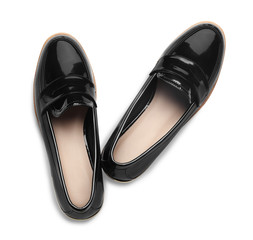 Pair of stylish female shoes isolated on white, top view