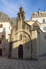 Fototapeta na wymiar Religious architecture. Montenegro, Old Town of Kotor, UNESCO-World Heritage Site. View of Church of St Luke on sunny winter day
