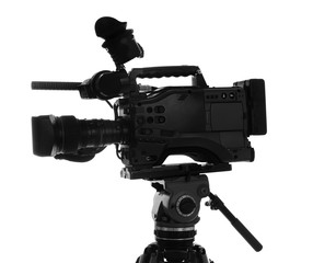 Modern professional video camera isolated on white