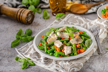 Fresh salad with roasted fish