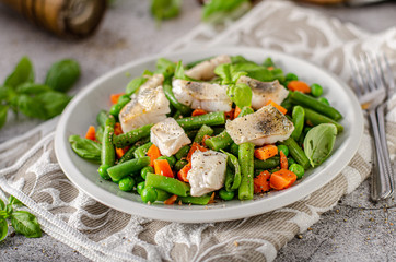 Fresh salad with roasted fish
