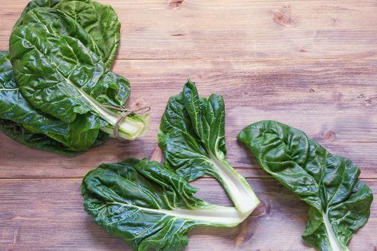 Balkan cuisine. Blitva ( chard leaves ) - popular leafy vegetables. Rustic background, free space for text