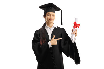 Young female graduate holding a degree certificate and pointing