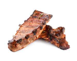 Tasty grilled ribs with thyme isolated on white