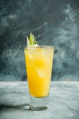 Pineapple cocktail in highball glass. Selective focus. Shallow depth of field.