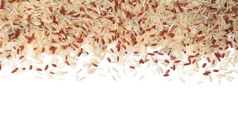 Mix of brown and polished rice on white background, top view