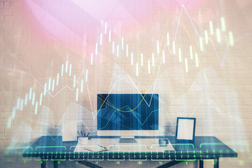 Financial graph colorful drawing and table with computer on background. Double exposure. Concept of international markets.