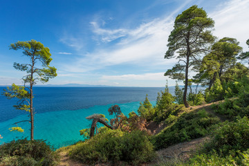 Amazing beautiful sea landscape of Greece. View from above at blue transparent sea water and clear sky. Horizontal color photography.
