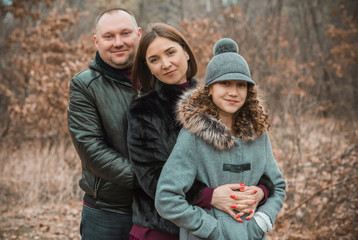 Fototapeta premium Portrait of happy family, relax at nature, relationship and lifestyle 