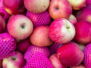 Fresh apples are piled up in a roadside shop in Vang Vieng, Laos.