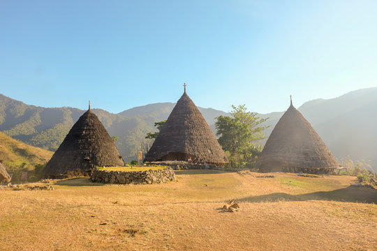 The authentic pyramid shaped houses in Wae Rebo village Indonesia