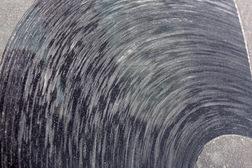 suv back window of a dirty car in a layer of dust and dry dirt, close up of a dirty vehicle glass with copy space.