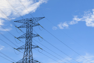 High-voltage tower with clear blue sky
