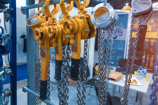 Lever winch. Tal lever. Manual chain hoist. Shallow depth of field. Focus on Chain Link