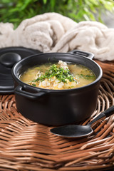 Barley soup with vegetables and chicken.