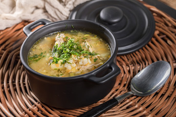 Barley soup with vegetables and chicken.