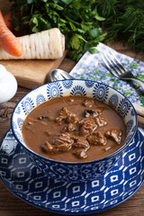 Goulash soup with pork and mushrooms.