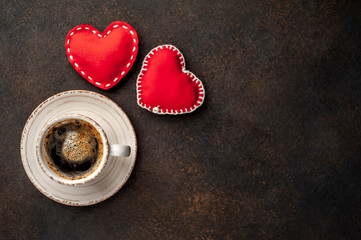 coffee and red hearts for valentine's day on stone background with copy space for your text