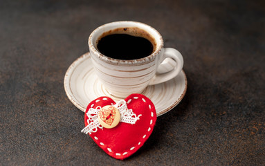 coffee and red heart for valentines day on stone background with copy space for your text