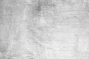 Texture of a concrete wall with cracks and scratches which can be used as a background