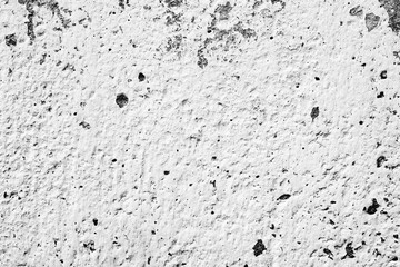 Texture of a concrete wall with cracks and scratches which can be used as a background
