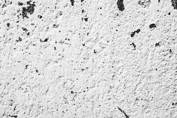 Texture of a concrete wall with cracks and scratches which can be used as a background