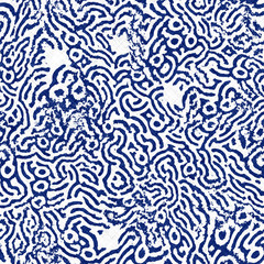 Fototapeta premium Indigo cyanotype dyed effect distressed worn bleached graphical motif. Noisy brushed faded mottled, intricate grungy stained navy design. Seamless repeat raster jpg pattern swatch.