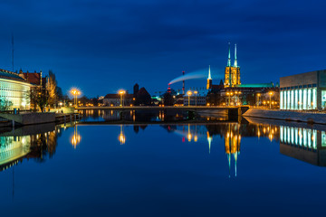 Fototapeta na wymiar The city of Gdańsk on the Odra River at dawn.