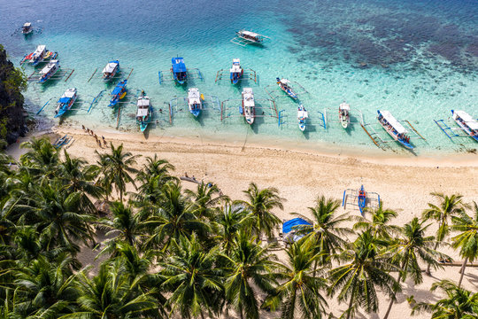 Top view of beautiful turquoise beach, with white sand. Best beaches of Philippines. Seven Commandos beach, Palawan