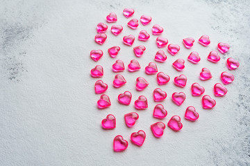 Pink heart on a white background, top view