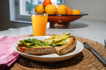 Toast with avocado and juice