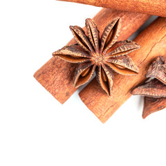 Star anise and cinnamon stick spice isolated on white background, top view