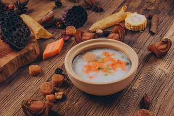 with mushrooms, scallions, shrimp, garlic, eggs, carrots to make a bowl of beauty porridge. 